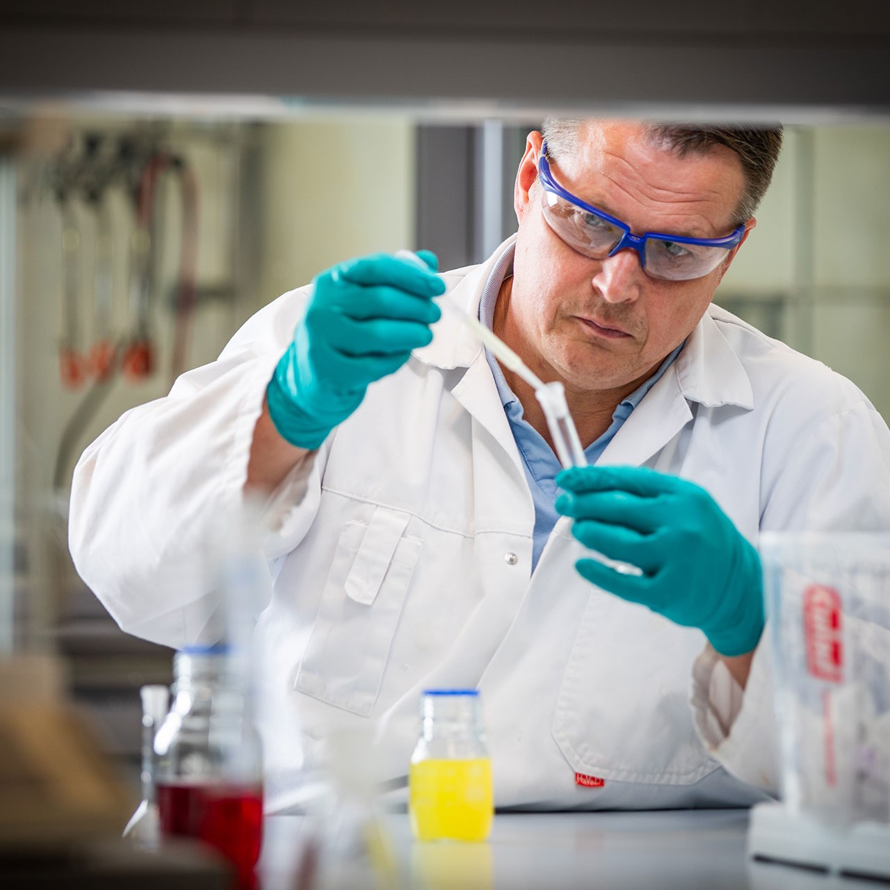 Man with test tubes